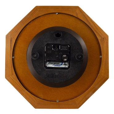 Wooden octagonal device with a battery labeled 'Energizer' on a white background