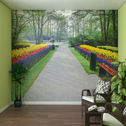 Wall Mural with a large wall mural of a garden pathway and colorful flowers.