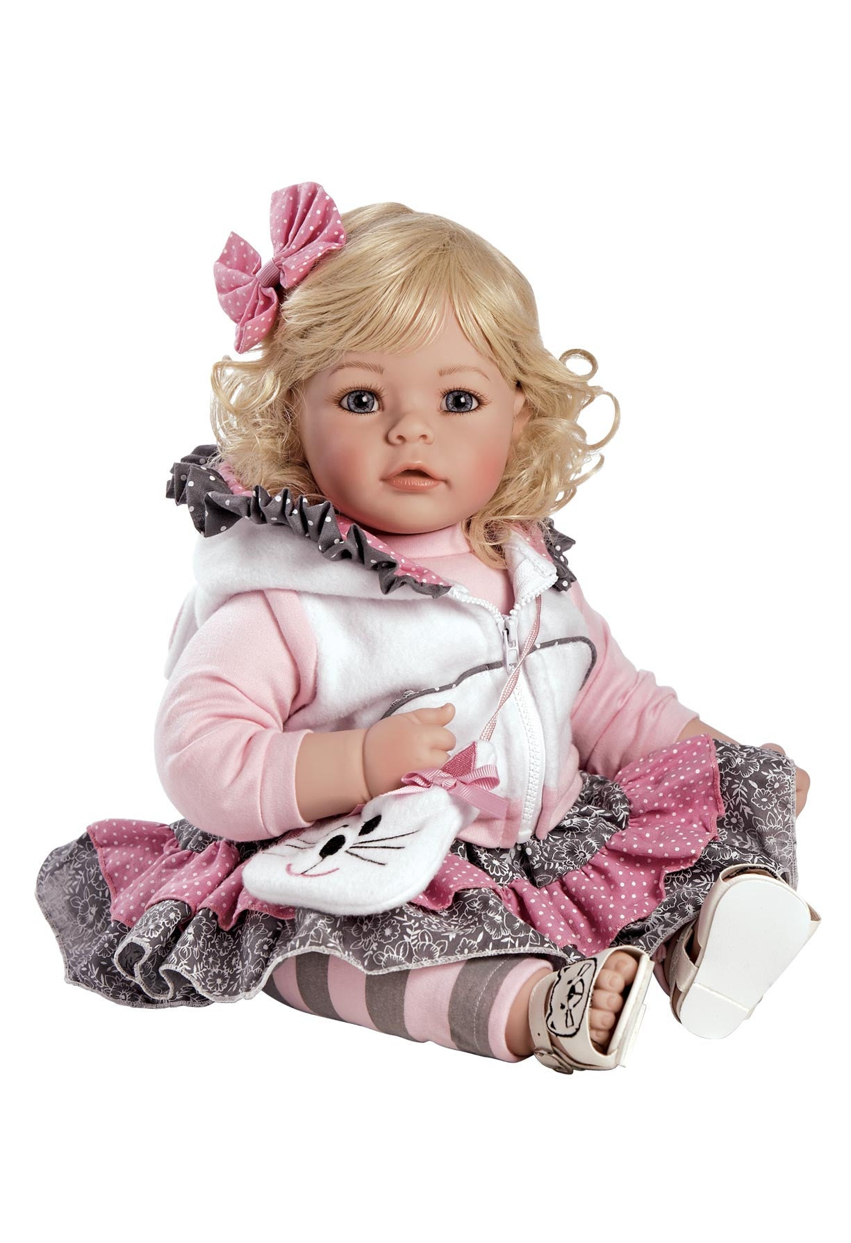 Therapy Doll for Memory Care  with blonde hair and a pink outfit 