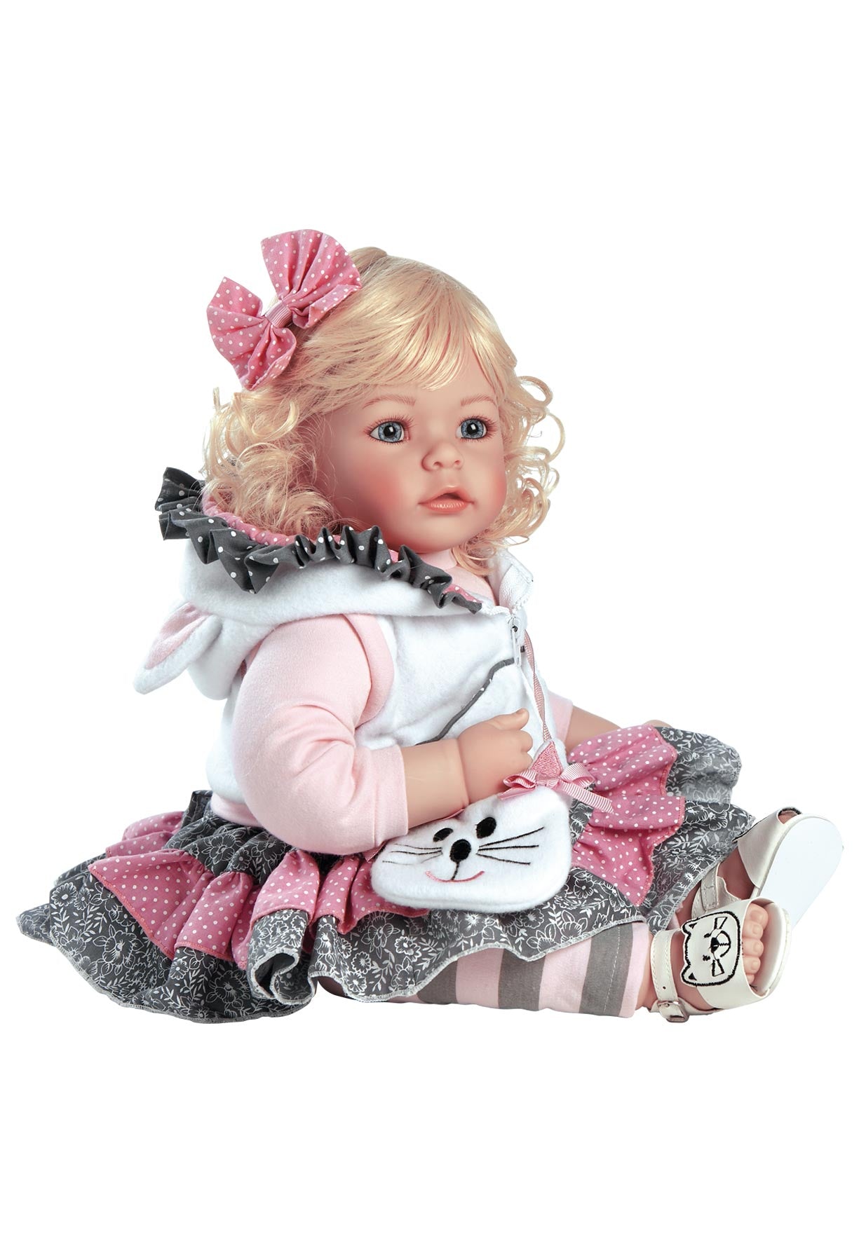 Doll with blonde hair, pink bow for memory care and dementia therapy
