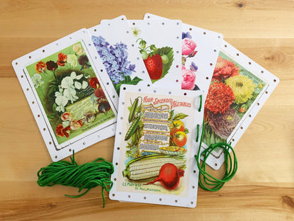 Set of vintage-style floral image cards on a plastic surface