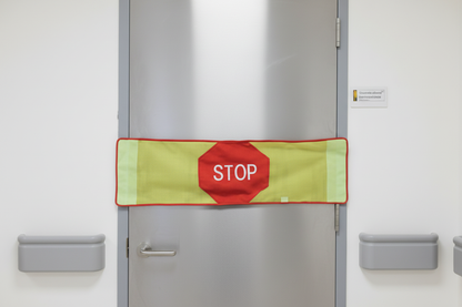 Close-up of door barrier on metal door